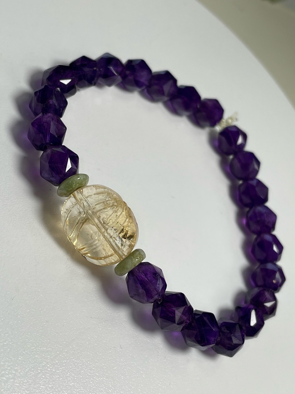 Vibrant Amethyst and Rutilated Citrine Focal Bead Stretch Bracelet.